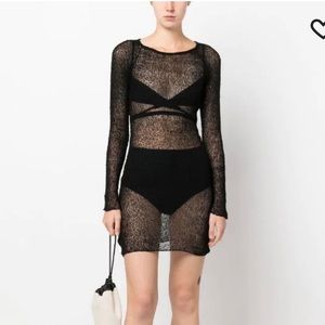 sheer constructionknitted constructionround necklong sleevesasymmetric hem